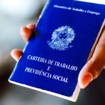 July 4, 2020, Brazil. Woman holds his Brazilian document work and social security (Carteira de Trabalho e Previdencia Social)